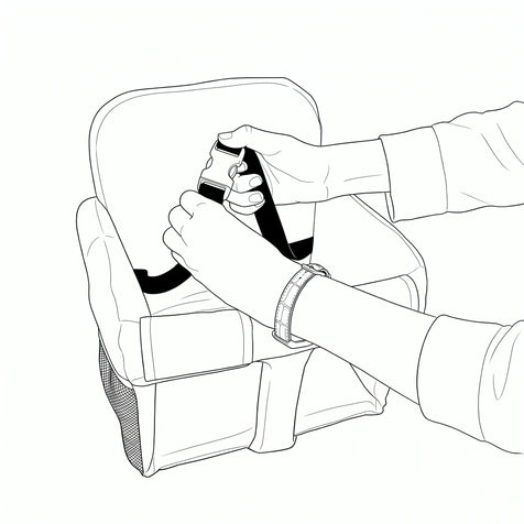 Two hands fastening the safety buckle strap on the Coco Comfort Seat padded insert