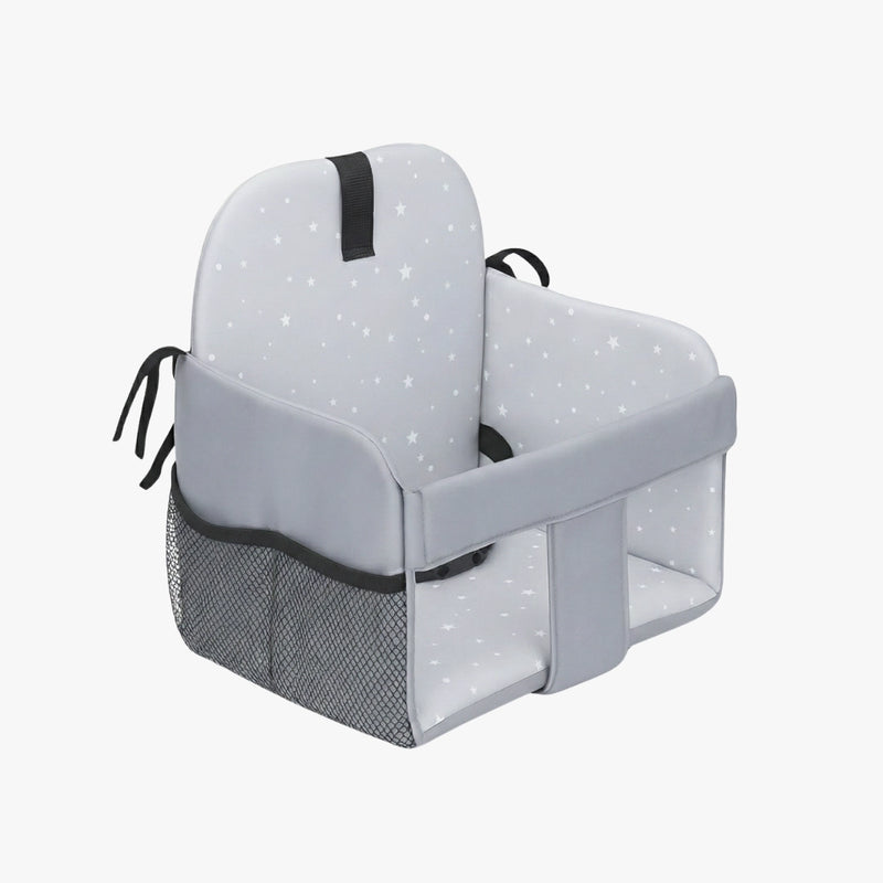 Cocoseat padded shopping cart seat insert in grey star pattern with mesh pocket and securing straps